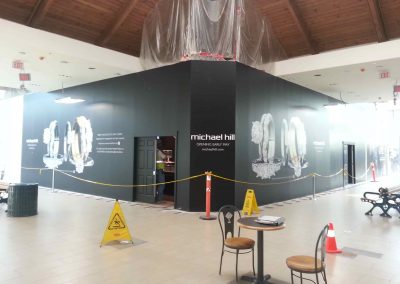 Black wall covered area in mall